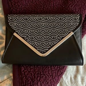 Black and silver ALDO clutch